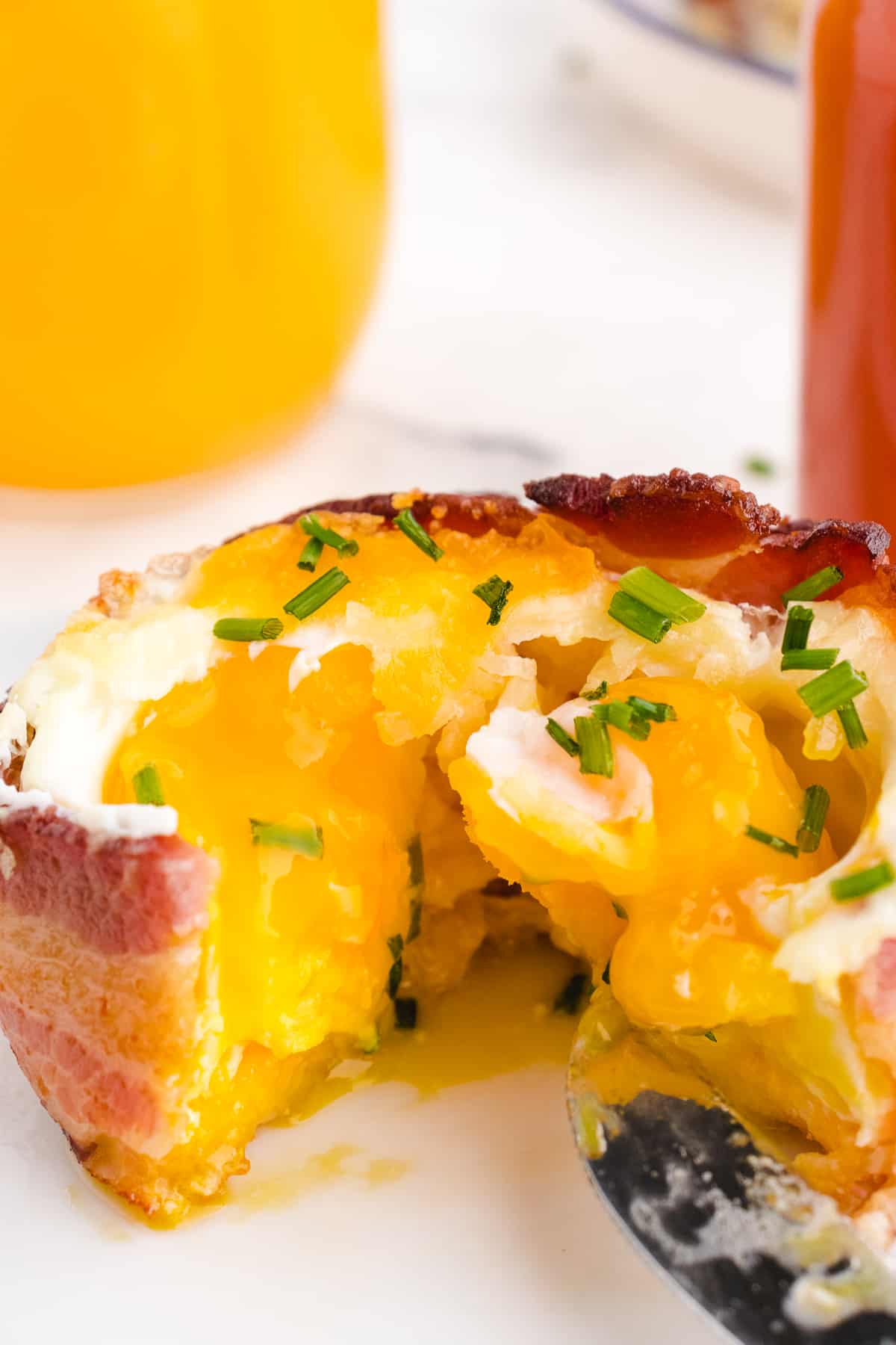 https://wholelottayum.com/wp-content/uploads/2018/06/bacon-egg-and-cheese-breakfast-cups.jpg