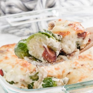 brussel sprouts casserole with bacon on a spoon