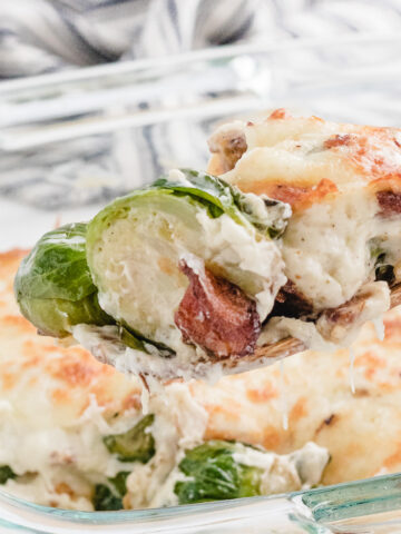 brussel sprouts casserole with bacon on a spoon