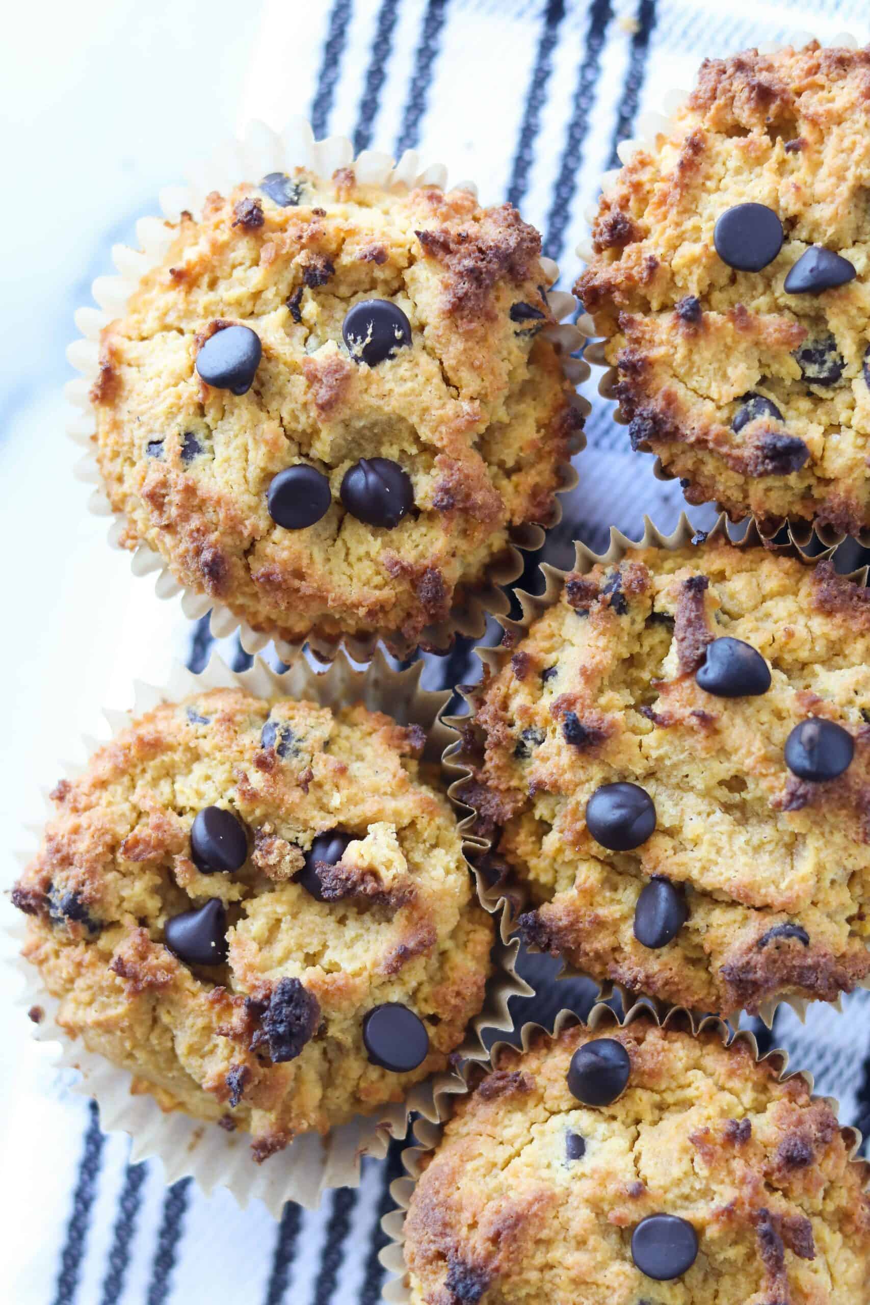 keto pumpkin muffins on a black and white towel top down