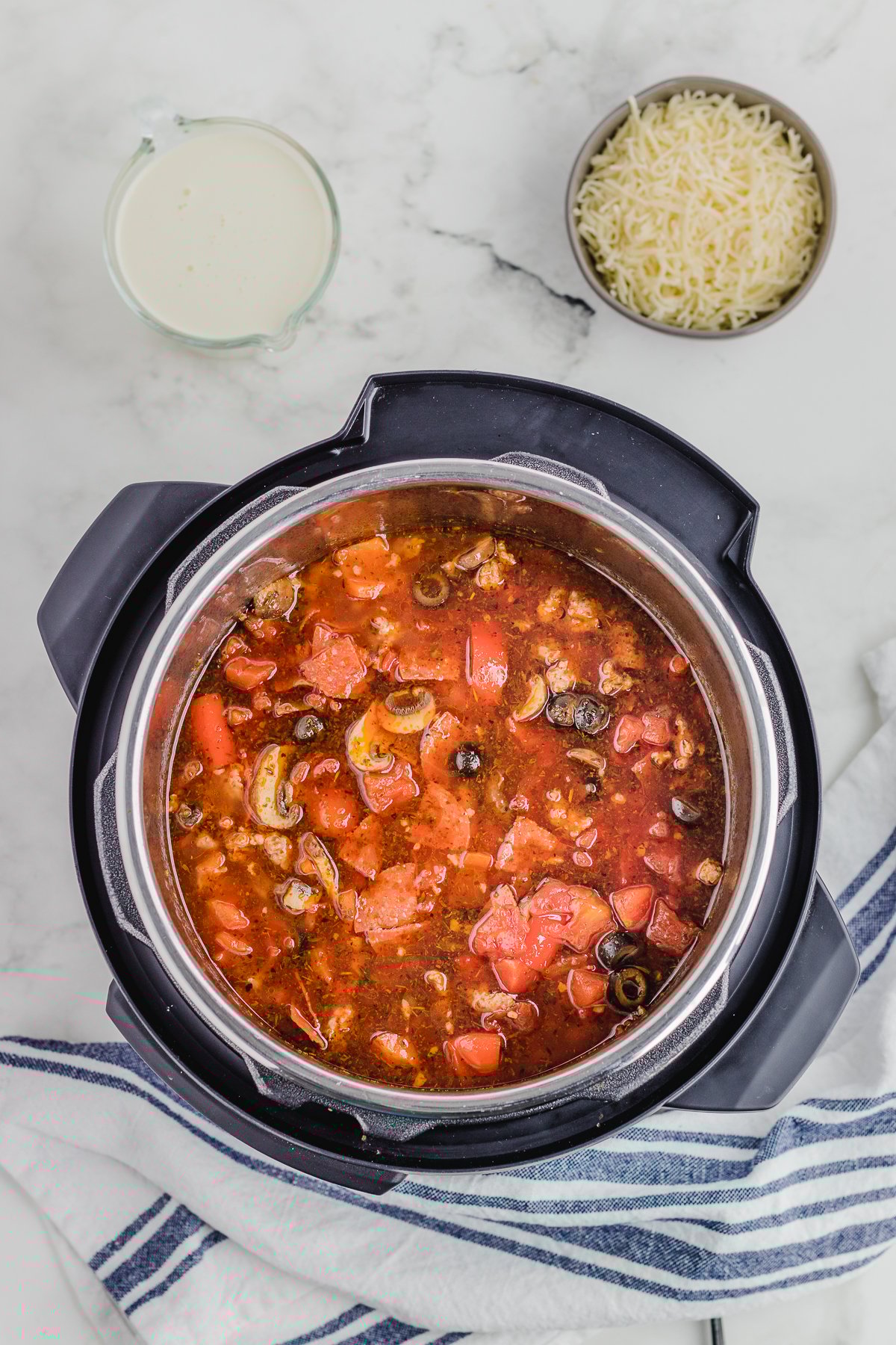 pizza soup in a pressure cooker after cooking face down image
