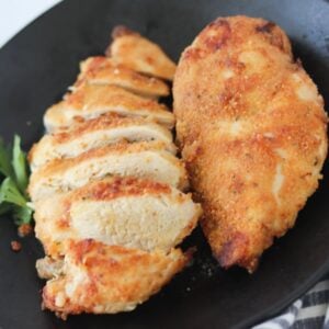air fryer breaded chicken breast on a plate after cooking