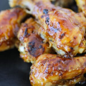 close up of instant pot chicken legs after broiling