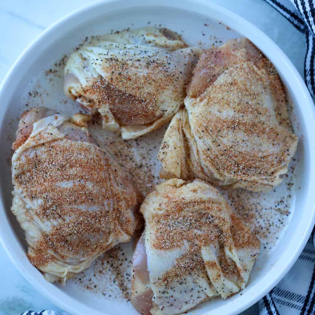 start the stovetop chicken thighs by seasoning the chicken