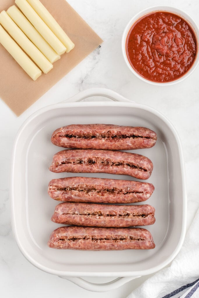 how to stuff sausage by slicing it lengthwise but not all the way through