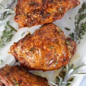 air fryer turkey thighs close up with crispy skin on bone in