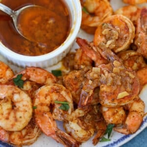 air fryer shrimp recipe with old bay can be served plain or with seafood sauce or garlic butter