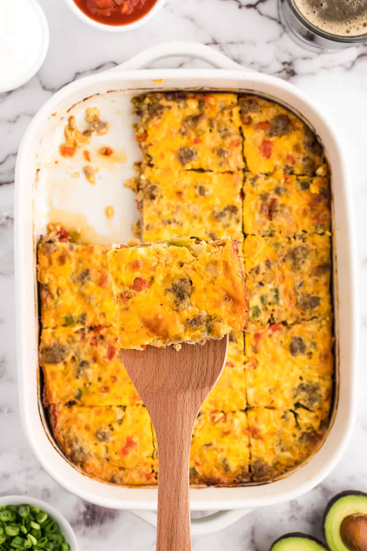 fully baked keto breakfast casserole with two slices taken out.