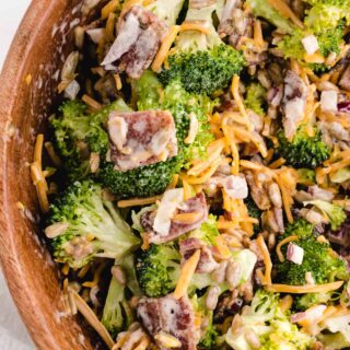 broccoli salad recipe with bacon in a wood bowl