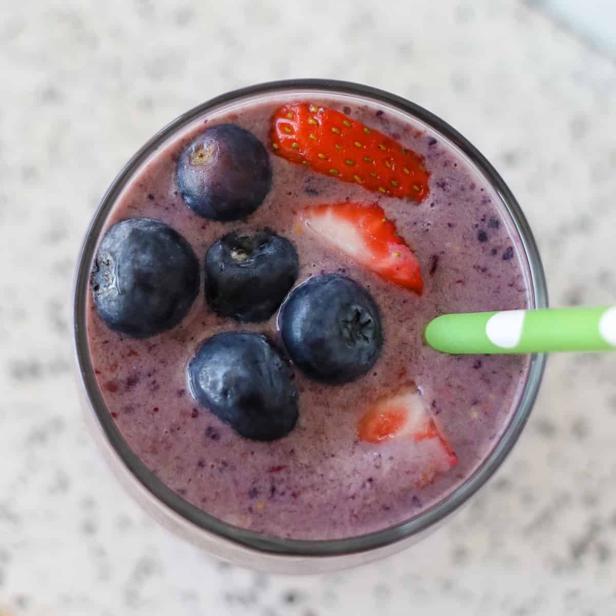 berry peanut butter smoothie close up from the top angle