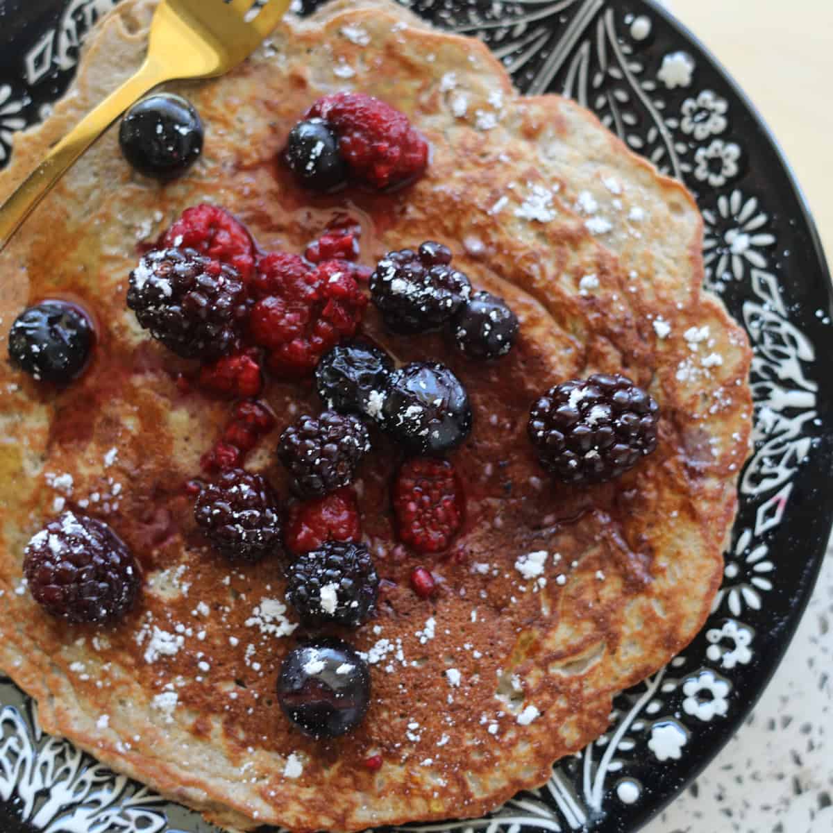 protein pancakes with protein powder and banana close up on a plate