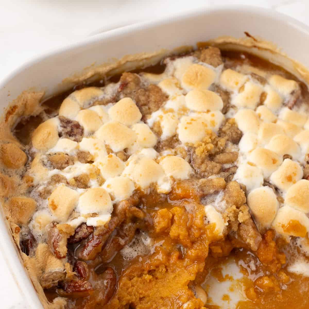 cropped image of marshmallow streusel topping being eaten with a spoon