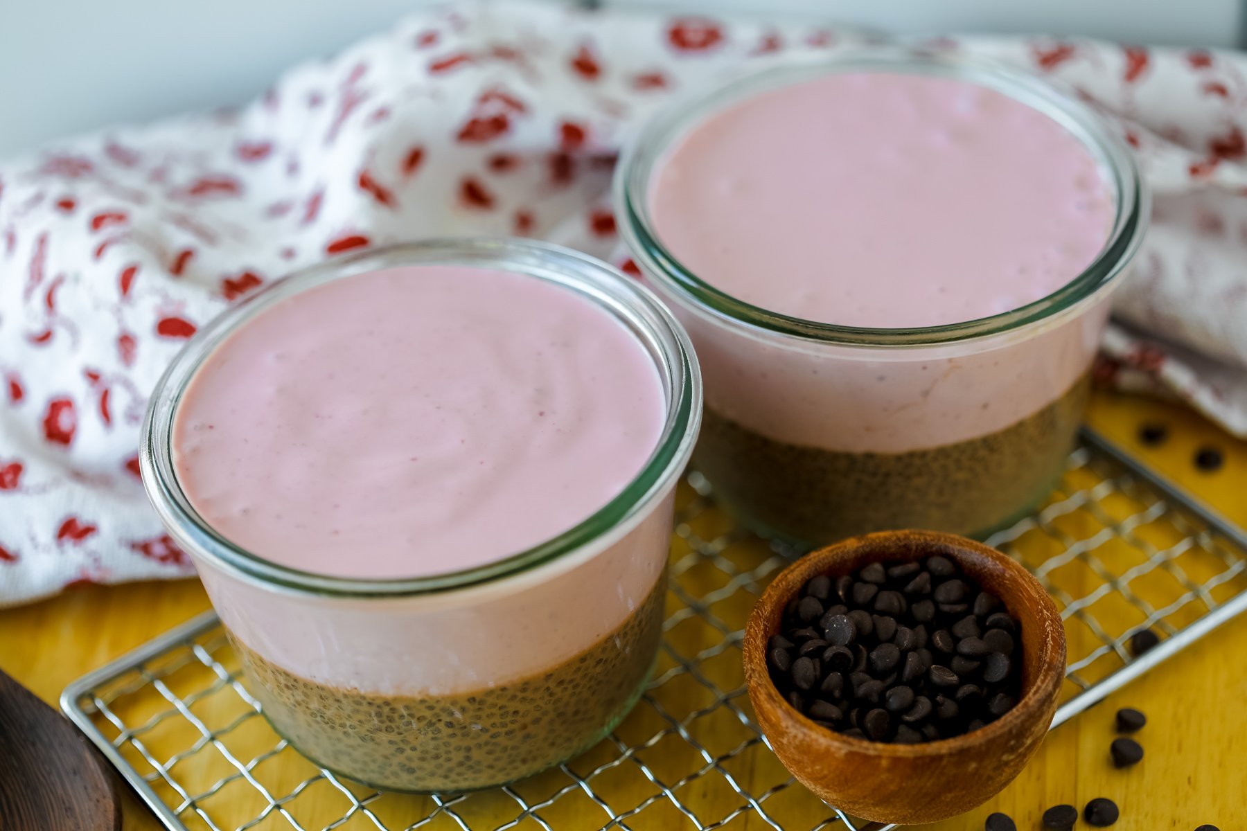 chocolate chia pudding with a Greek yogurt layer sitting on a cutting board