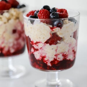 overnight oats with cottage cheese and frozen fruit close up in a dessert dish
