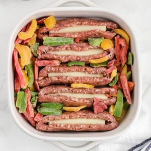 stuffed sausage assembled in a baking pan before cooking in the oven