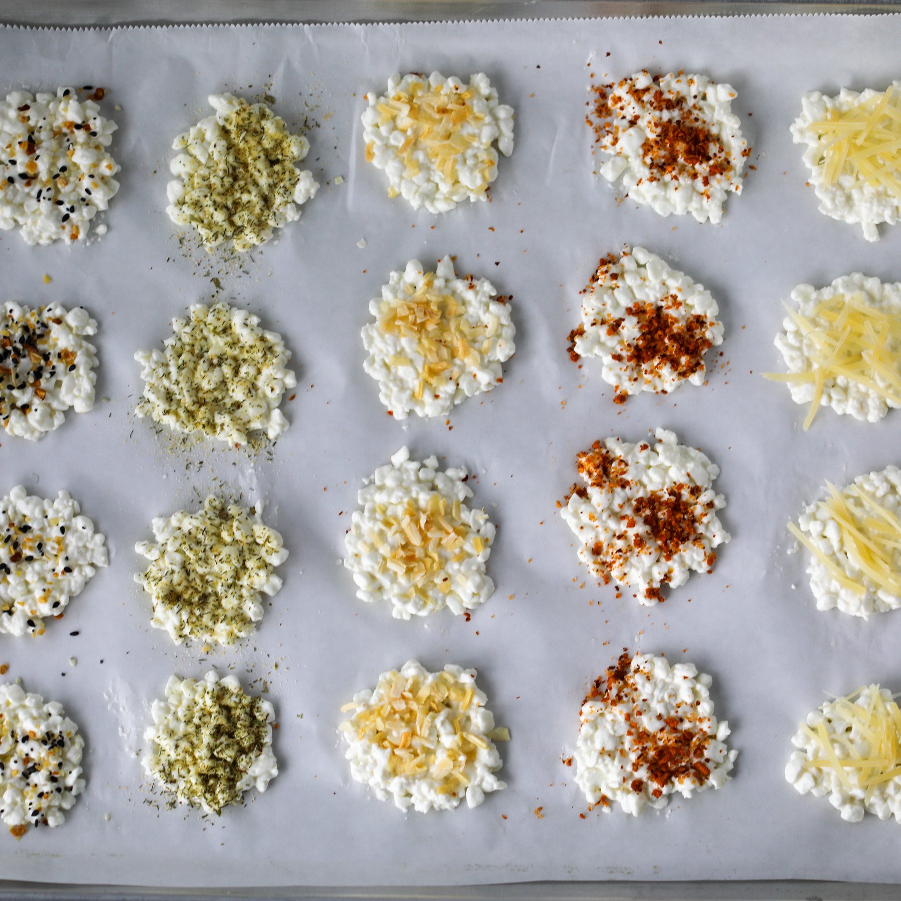 sprinkling seasoning on the top of the cottage cheese chips before baking them