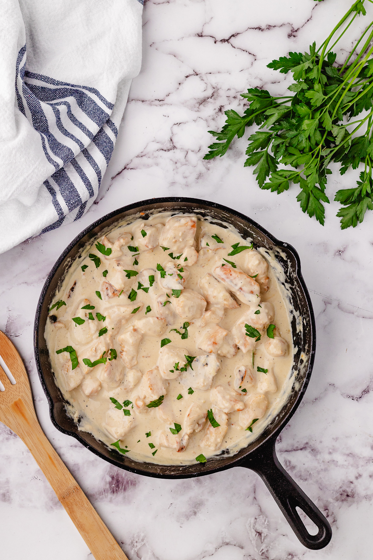 high protein chicken alfredo in a skillet after cooking