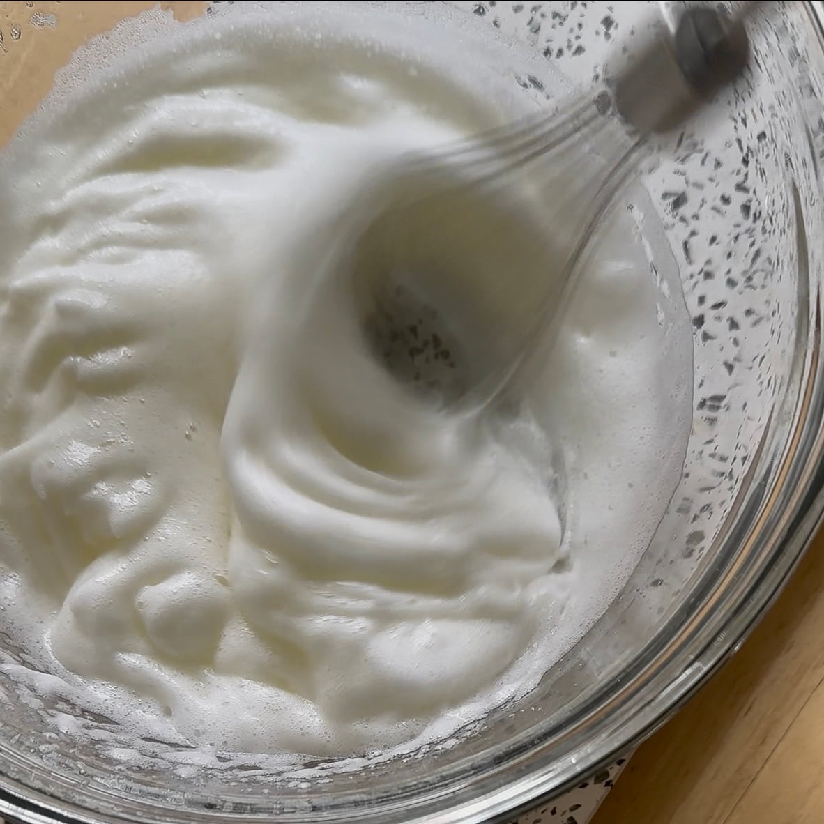 blending the cottage cheese with an immersion blender for the fluffy cottage cheese cloud bread