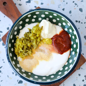 copycat big mac sauce ingredients in a bowl before turning it into burger sauce