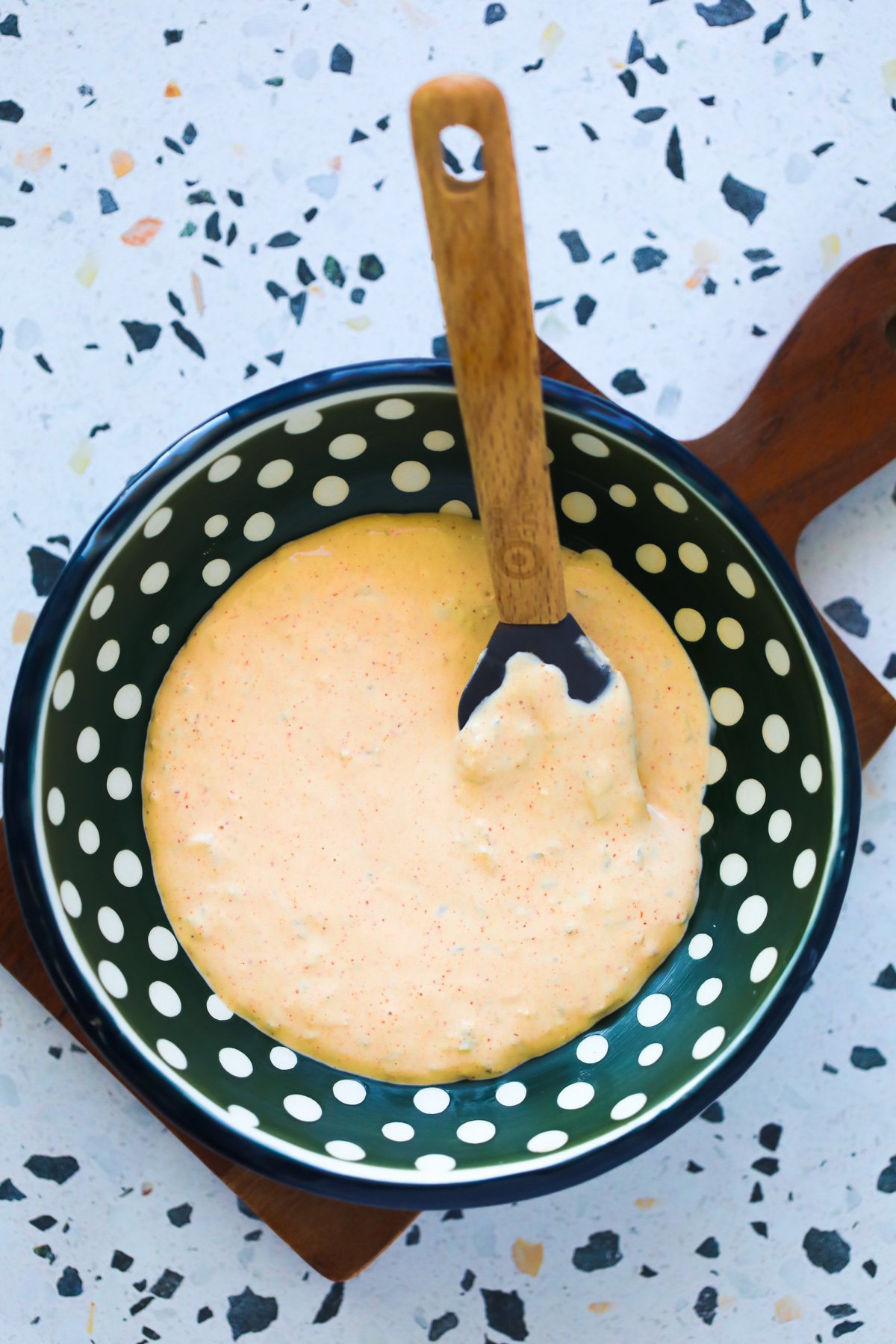 healthy big mac sauce ingredients blended in a green and white bowl