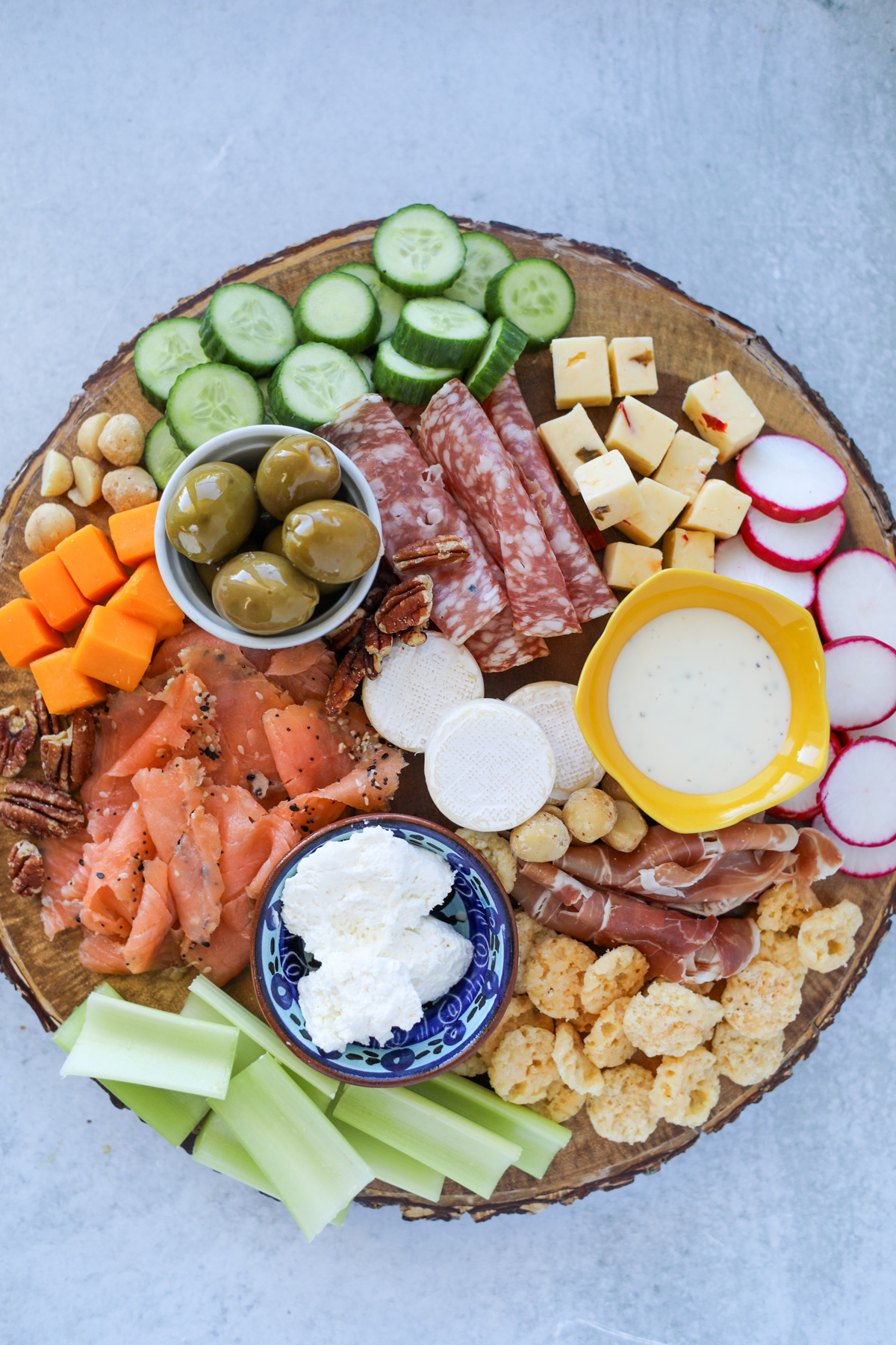 our no carb charcuterie board is keto low carb and carnivore and features a variety of meats cheese nuts and vegetables