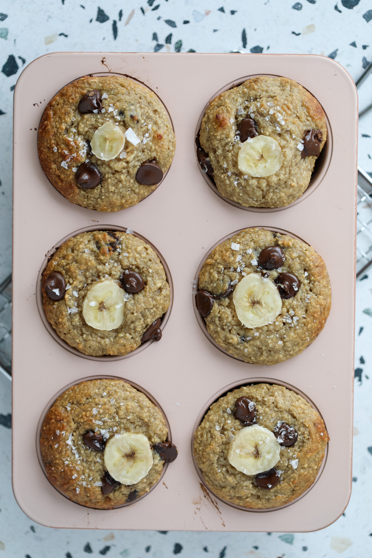 banana protien muffins with cottage cheese in a muffin tin