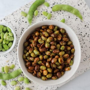 crispy air fryer edamame beans served in a bowl after being cooked in the air fryer