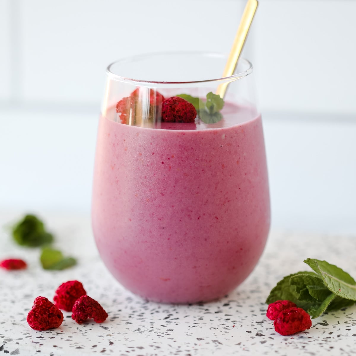 raspberry protein smoothie without yogurt on a cutting board